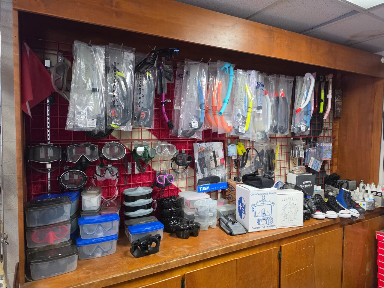 Masks and OTS equipment on display in the shop